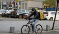 a man riding a bicycle.